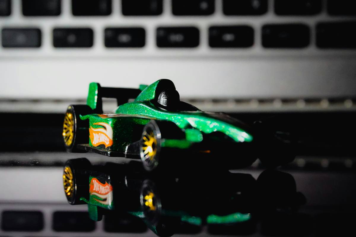 Slot car racing online setup with digital interface and physical track